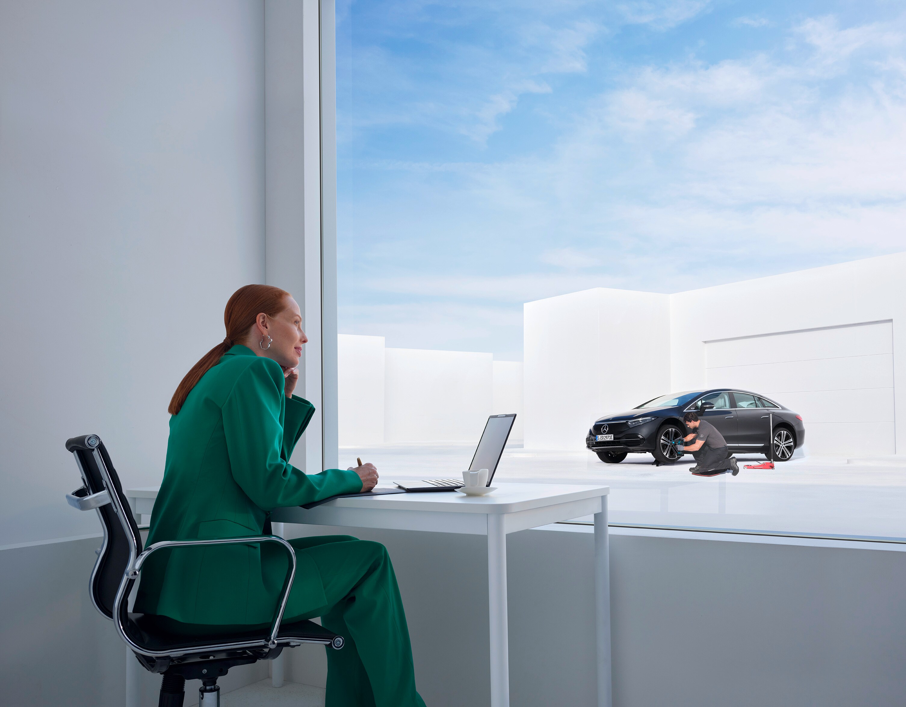 Damage and Breakdown | Mercedes-Benz Woman leaning on her Mercedes-Benz on the phone.